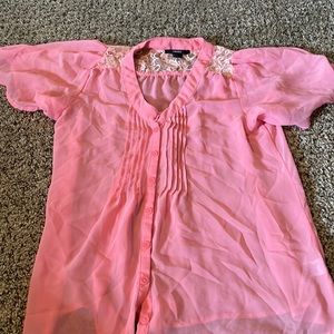 See through pink blouse